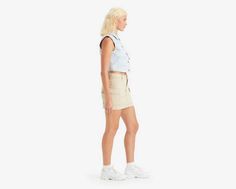 Your favorite cargos;in skirt form. With an ultra-flattering mid rise and an above-the-knee length cut, our Mini Cargo Skirt features oversized patch pockets and effortless '90s style. A throwback cargo skirt With an ultra-flattering mid rise Cut with a mini length Casual Skirt With Built-in Shorts For Work, Spring Cargo Pocket Short Skort, Casual Short Skort With Cargo Pockets, Summer Cotton Cargo Skort, Summer Cotton Skort With Cargo Pockets, Spring Short Skort With Cargo Pockets, Summer Cargo Pocket Short Skort, Short Cargo Skirt With Pockets For Work, High Waist Cargo Skort For Summer