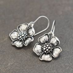 Pewter Dogwood Flower Earrings. a perfect nature inspired gift for a loved one, special friend or just for you! DETAILS ♥ Earrings are 1.1/4 inch in length. ♥ On hypoallergenic surgical steel french earring wire.. ♥ All Earrings come with rubber ear backs. ♥ All of my pewter is lead free. SHIPMENT & DELIVERY ♥ All my items are ready to ship within 1-3 business days. ♥ Packages are typically shipped via USPS First Class Mail 2-6 business days. ♥ All shipments with in the United States include Hypoallergenic Silver Flower Earrings For Gift, Mother's Day Nickel-free Sterling Silver Flower Earrings, Flower-shaped Nickel-free Earrings For Mother's Day, Nickel-free Flower-shaped Earrings For Mother's Day, Nickel Free Flower Shaped Earrings For Mother's Day, Silver Flower Earrings For Mother's Day, Nickel Free Flower Earrings For Anniversary, Nickel-free Flower Earrings For Anniversary, Nickel Free Silver Flower Earrings