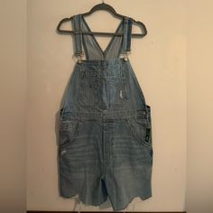 Gap Distressed Denim Shortalls- Size Medium These Shortalls Are The Perfect Medium Wash With Such Cute Subtle Distressed Detailing And A Raw Hem. Unfortunately, These Were Just A Bit Too Large On Me. Brand New With Tags! My Loss Is Your Gain! Measurements (All Shown In Photos, Approximate, And Taken Flat): Waist: 18” Hips: 22” Leg Opening: 11” Inseam: 5” Length From Top Of Torso To Bottom Hem: 27.5” (This Does Not Include The Straps, Which Are Adjustable) Spring Cleaning! Lots Of Items Size S/M Trendy Distressed Overall Bottoms, Dark Wash Distressed Overalls, Cotton Ripped Jean Overalls, Ripped Cotton Denim Overalls, Ripped Cotton Overall Jeans, Cotton Ripped Overall Jeans, Cotton Ripped Jeans Overall, Denim Overalls With Frayed Hem, Cotton Overalls With Frayed Hem