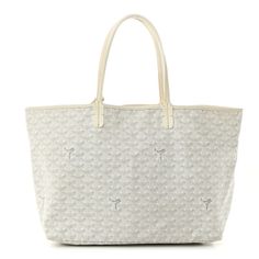 This is an authentic GOYARD Goyardine Saint Louis PM in White. This tote is crafted of Goyard chevron white canvas. The bag has a white leather trim along the top and white leather handles. The top is open to a white canvas interior with a matching removable pouch. Designer White Bag With Canvas Lining, White Designer Bag With Canvas Lining, Designer White Bags With Canvas Lining, White Shoulder Bag With Canvas Lining For Shopping, White Shopping Bag With Canvas Lining, White Bags With Leather Trim For Shopping, White Rectangular Monogram Canvas Bag, White Bags With Leather Trim And Double Handle, White Canvas Bags With Leather Handles