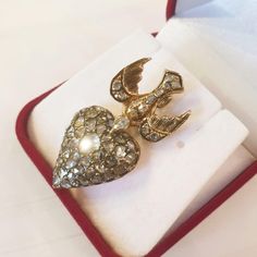 Antique victorian era heart pendant with rose cut diamonds hanging with a swallow bird in 10k gold back foiled diamonds estimate weight 1.5 carats pendant lenght 3.5cm was made 1880/1890.c