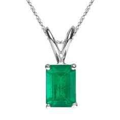 Natural Emerald Cut AA Quality Emerald Solitaire Pendant in 14K Gold Available in 5x3MM-8x6MM Pendant Information Metal:14K Gold Actual Metal:14K White Gold Rhodium:Yes Product Type:Solitaire Pendant Gender:Womens Material:Gemstone Chain Information Metal:14K Gold Actual Metal:14K White Gold Chain:Singapore Chain Length:18 in Clasp:Spring Ring Clasp Gemstone Information Gemstone:Natural Emerald Shape:Emerald Average Color:Medium Green Average Quality:AA Gemstone Dimensions:5x3 mm - 8x6 mm Settin Classic Emerald Cut Gemstone Necklace, Classic Emerald Pendant Necklace, Classic Green Gemstone Necklace, Green Diamond-cut 14k Gold Necklace, 14k Gold Green Diamond Cut Necklace, Classic Emerald Necklace For May Birthstone, Classic Emerald Pendant Necklace With Prong Setting, Classic Diamond Cut Emerald Pendant Necklace, Classic Emerald Diamond Cut Pendant Necklace