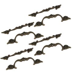 set of six antique style pull handles with scrolls and flowers on each handle, bronze