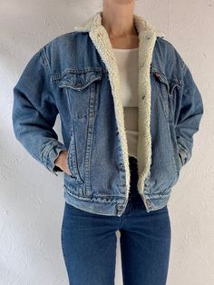 - Vintage 1980s Levis faux shearling lined denim jacket - Snaps up the front - Made in USA - Tagged L but fits womens XS Chest: 20.5" Length: 23" Sleeve: 19" Affordable Levi's Denim Blue Outerwear, Fleece Lined Denim Jacket Outfit, Cheap Levi's Long Sleeve Outerwear, Retro Medium Wash Outerwear For Winter, Retro Medium Wash Winter Outerwear, Retro Denim Blue Jacket For Winter, Wool Jacket Outfit, Denim Jacket Women Outfit, Fall Denim Jacket