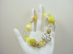 Bring on the sun!  New Bracelet in the Pantone Buttercup colors for spring  by Deerwoman Designs(17 photos) New Bracelet, Lotus, The Sun, Charms