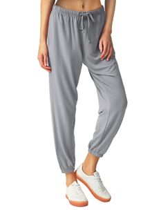 PRICES MAY VARY. ➤COMFORT - Super soft and comfy with high elasticity of the whole pajama pants. Sweat absorbing fabric. ➤DETAILS - The stretch pajama bottoms have 2 large side pockets with flexible waist and cuff. ➤SIZING – Loose-fit lovers refer to the size chart in the picture. One size smaller is also fitted for people with standard figure. ➤FITTING – Suitable for for jogging, yoga, dance,casual wear and relaxing indoor activities ➤WASHING INSTRUCTIONS - Gentle machine wash below 40 degree C Athleisure Harem Pants For Loungewear With Relaxed Fit, Comfortable Drawstring Pants, Baggy Drawstring Harem Pants For Loungewear, Baggy Harem Pants With Drawstring For Loungewear, Casual Sleep Pants With Pockets, Baggy Solid Color Activewear For Loungewear, Solid Color Baggy Activewear For Loungewear, Comfortable Stretch Harem Pants For Loungewear, Stretch Cotton Harem Pants For Leisure