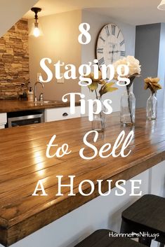 a kitchen counter top with the words 8 staging tips to sell a house