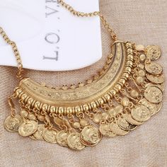 Antique Gold Bohemian Gypsy Coin Statement Necklace Wear This Gorgeous Necklace As A Statement Piece With Your Favorite Boho Dress. Lightweight Zinc Alloy Metal. Bundle And Save. 5 Star Rated Seller. Same And Next Day Shipping Gold Bohemian Coin Pendant Necklace, Bohemian Style Coin Necklace For Festivals, Bohemian Coin Necklace, Gold Bohemian Coin Necklace, Bohemian Gold Coin Necklace, Boho Statement Necklace, Jewelry Antique, Gold Statement Necklace, Coin Necklace