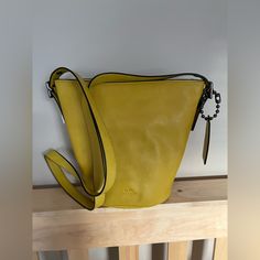 Brand New Saffron Yellow Coach Crossbody Bucket Purse Elegant Yellow Bucket Bag With Removable Pouch, Elegant Yellow Bucket Bag For Daily Use, Elegant Yellow Bucket Bag With Adjustable Strap, Elegant Yellow Bucket Bag With Detachable Strap, Elegant Yellow Bucket Bag For Everyday, Elegant Everyday Yellow Bucket Bag, Elegant Yellow Everyday Bucket Bag, Elegant Yellow Bucket Bag, Elegant Yellow Hobo Bag For Daily Use