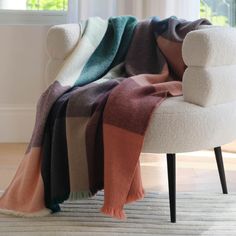 a chair with a blanket on top of it