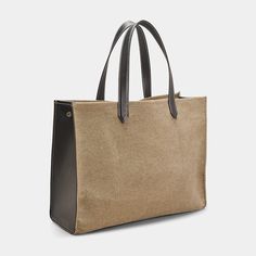 Balmain "B Army" tote bag in cotton, linen, and calf leather  Flat shoulder straps  Open top with hook closure; side snap closures  Interior, one flap pouch and one card slot  Approx. 16.5"H x 13.3"W x 5.9"D Spot clean Made in Italy Brown Coated Canvas Box Bag For Travel, Travel Box Bag In Brown Coated Canvas, Rectangular Coated Canvas Bag With Removable Pouch, Top Handle Bag In Coated Canvas With Removable Pouch, Luxury Large Capacity Satchel Canvas Bag, Brown Coated Canvas Box Bag For Daily Use, Brown Coated Canvas Box Bag For Everyday Use, Modern Brown Canvas Bag For On-the-go, Modern Canvas Bags For On-the-go