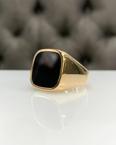 Men Ring with Onyx, Black Pinky Signet Ring, Square Shape Genuine Gemstone, Stylish Gold / Silver Ring, Handmade Jewelry, Best Gift for Him ◎ Details ◎ ○ Material 14K Solid Gold or 925 Sterling Silver Weight of Ring : approx 18.00 gr Height of Ring : approx 5.30 mm ○ Upgrade to Solid 18K Gold, please click the link below: https://www.etsy.com/listing/962826004 ○ Gemstone Natural Onyx Gemstone approx. 15 mm x 15 mm 4.23 ct Made to Order HANDMADE ITEM ○ For Men Collection : https://etsy.me/2PmKJMW Luxury Black Tarnish-resistant Ring, Timeless Onyx Gemstone Rings, Onyx Open Ring For Formal Occasions, Formal Onyx Rings With Polished Finish, Formal Onyx Open Ring Jewelry, Luxury Hallmarked Onyx Rings, Classic Onyx Ring Jewelry, Classic Gold Onyx Rings, Modern Onyx Ring Gift