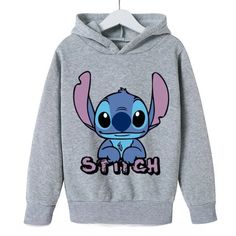 a gray sweatshirt with an image of stitch on the front and pink lettering that says stitch