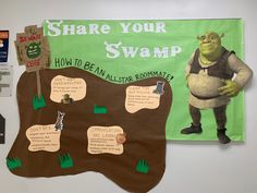 a bulletin board with an image of a cartoon character on it and other information about swamp