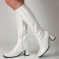 Step up your style game with these White Patent Leather Fashion Below-The-Knee Heeled Boots. Perfect for women who want to make a bold statement with every step they take. Color: White Material: Patent leather Heel Type: Chunky heel Heel height: 2.36" / 60 mm approx Product measurements were taken using size 8. Please note that measurements may vary by size. Toe: Square toe Half-length zipper design makes it easier to wear on Handcrafted US sizing. Fits true to size. White Gogo Boots, 20s Shoes, Disco Shoes, 70s Boots, Retro Boots, Heel Boots For Women, Hippie Top, Gogo Boots, Chunky Heels Boots