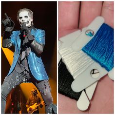 a hand holding a blue and white hair brush next to a photo of a doll