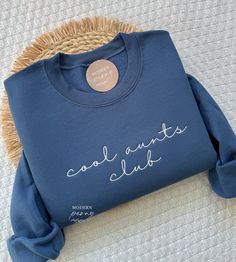 Cool Aunts Club Sweatshirt, Embroidered Aunt Crewneck, Aunt Gift, Auntie Mothers day gift, New Aunt Sweatshirt, Aunt Gifts, Aunt Crewneck, first picture is indigo sweatshirt with white thread ---HOW TO ORDER---   FOR EACH SHIRT CHOOSE: **Shirt type, size and color 1) Name on Shirt 2) est date or no date 3) Thread Color - in pic #3 thread on white shirt Please note: If we don't receive all needed custom details, , we will make it to the default, thread color and sleeve type based on the color ord Indigo Sweatshirt, Aunt Sweatshirt, New Aunt, Christmas Baskets, Club Sweatshirts, Aunt Gifts, Material Girl, Material Girls, Star Fashion