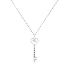 This sweet and romantic style diamond key pendant will brighten her smile. Crafted on sterling silver the heart-shaped bow of the key sparkles with a bezel set round cut diamond, while the stem and blade features 5 alluring prong set round cut diamonds. This pendant hangs from a cable chain. Total diamond weight is 1/20 ctw. Lock Pendant, Bezel Set Diamond, Key Pendant, Heartfelt Gifts, Romantic Style, Matching Bracelets, Her Smile, Round Cut Diamond, Bezel Setting