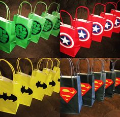 the bags have different designs on them and are decorated to look like superheros'capes