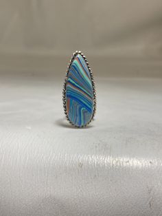 "Rainbow Casilica Ring sterling silver women girls Size 6.75 Weight 7.4g Length 1. 3/4\" Width. 3/4\" Thinnest part of band 1/8\" Free Shipping & Free Postal Insurance Delivered in a Gift Box If you do not want the ring polished and want to leave the natural patina please let me know at the time of purchase as I do polish rings before I ship rings out. Thanks USPS Domestic Shipping is free for buyers. If a buyer prefers to upgrade to priority, the buyer will pay that portion of the shipping Silver Sterling Teardrop Rings, Silver Teardrop Sterling Silver Rings, Silver Sterling Silver Teardrop Rings, Silver Teardrop Cabochon Rings, Collectible Blue Rings, Blue Sterling Silver Teardrop Ring, Silver Teardrop Nickel-free Rings, Sterling Silver Teardrop Blue Ring, Silver Nickel-free Teardrop Rings