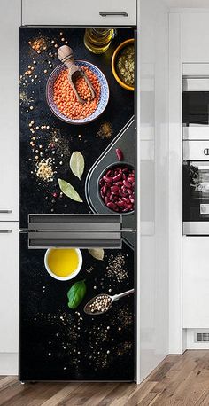 a kitchen with an oven, stove and various food items on the counter top in front of it