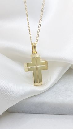 Greek Orthodox Solid 18k Baptism Gold Cross. An excellent handmade cross combines two techniques. Glossy flat surface with carved cross and matte broken corners A heavy solid Greece Gold Cross it can be the first jewelry for your little nowborn baby   A unique jewelry ideal for baptism cross - as well as a great gift for any occasion (birthday graduation engagement) Handmade in Greece in our laboratory in Sparta. -It can be personalized by engraning on the back side of the cross a name or a date- Details: Height39mm Width:20mm Weight:Approximately 10,5gr 14k - 11,5gr 18k Metal:14k Yellow Gold - 18k Yellow Gold Style:      Baptism Cross ❣️ For more  crosses take a look here      👉  https://www.etsy.com/shop/GiorgosJewelry?ref=seller-platform-mcnav&section_id=15859824 🎁 All of our jewelry Yellow Gold Cross Pendant Necklace For First Communion, Yellow Gold Cross Necklace For First Communion, Yellow Gold Cross Charms For Baptism, Yellow Gold Cross Necklaces For Baptism, Yellow Gold Cross For Baptism, Classic Gold Jewelry For Baptism, Spiritual Yellow Gold Jewelry And Charms For First Communion, Spiritual Yellow Gold Jewelry For First Communion, Gold Cross Pendant Jewelry For Confirmation