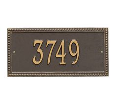 an address plaque with the number 379 on it