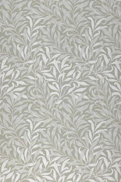 a white and grey wallpaper with leaves on it