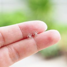 Tiny Flower Earrings (1 pair) ✦ Dimension Flower Size: 4 mm The post: 0.6x10 mm ✦ Material : 925 sterling silver, Hypoallergic Nickle free and Lead free (Good for sensitive ear skin) ✦ It's completely natural for sterling silver to oxidize over time when it's exposed to air. After each wear, use sterling polishing cloth to make them shine like new again and Please keep them in Box or Ziplock bags! ✦ We accept credit and debit card transactions, some bank transfer services, PayPal, Etsy Gift Card Flower Simple, Flower Stud Earrings, Ziplock Bags, Flower Stud, Flower Earrings Studs, Tiny Flowers, Flower Studs, Earrings Sterling Silver, Bank Transfer