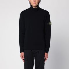 Black wool-blend Stone Island jumper featuring a high collar, long sleeves with Compass logo label and straight hem. Fall Long Sleeve Sweatshirt With Logo Patch, Winter Long Sleeve Sweatshirt With Logo Patch, Fall Sweater With Logo Patch, Fall Long Sleeve Sweater With Logo Patch, Winter Long Sleeve Tops With Logo Patch, Casual Winter Sweater With Logo Patch, Black Wool Turtleneck With Ribbed Cuffs, Black Turtleneck Polo Sweater, Modern Sweater With Funnel Neck