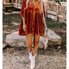 You Will Be Channeling All The Fall Vibes When You Arrive In Our Pretty Dark Rust Hued 'Maple Latte' Dress Featuring Luxe Velvet Material, A Button Down Front With A Collared Neckline, Bubble Half Sleeves, And A Relaxed Silhouette That Ends In A Tunic-Length Hemline! Self: 95% Polyester 5% Spandex Bust 44 In Waist 44 In Hip 46 In Length 33 In Sleeve Length 12 In Shift Dress For Fall Brunch, Fall Short Sleeve Mini Dress For Day Out, Fall Brunch Shift Dress, Shift Mini Dress For Fall Day Out, Fall Shift Mini Dress For Day Out, Fall Short Sleeve Mini Dress For Vacation, Fall Day Out Shift Mini Dress, Mini Length Dress For Fall Vacation, Bohemian Short Sleeve Mini Dress For Fall