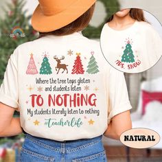 Teacher Christmas Shirt Tree Tops Glisten and Children Listen to Nothing, Funny Teacher Xmas Shirt, Teacher Holiday, Teacher Christmas Gifts ↓ Click here to view our additional fashionable collections ↓ https://handcraftedbyhelenn.etsy.com Product Details: - 100% Cotton (fiber content may vary for different colors) - Medium fabric (5.3 oz/yd2 (180 g/m2)) - Classic fit - Tear away label - Runs true to size Care instructions: - Machine wash: warm (max 40C or 105F); - Non-chlorine: bleach as needed; - Tumble dry: Medium - Do not iron; Do not dry clean ● Please choose your preferred style, size, and color from the dropdown menu or leave us a message in the "notes to seller" section. ● We are committed to processing and shipping your items as quickly as possible, but please note that custom pri Christmas Teacher Gift, Xmas Shirts, Funny Teacher, Teacher Christmas Gifts, Holiday Shirt, Teacher Christmas, Tree Tops, Teacher Humor, Holiday Shirts