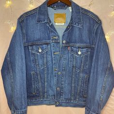 Nwot Levi’s Denim Jean Jacket! Stylish With Any Jeans Or Over A Dress , Perfect For Layering! Levi's Dark Wash Outerwear With Button Closure, Classic Dark Wash Denim Outerwear, Classic Long Sleeve Denim Outerwear, Classic Long Sleeve Denim Blue Outerwear, Classic Levi's Blue Denim Jacket, Classic Levi's Denim Outerwear, Classic Blue Levi's Denim Jacket, Classic Blue Denim Jacket With Pockets, Classic Blue Denim Jacket With Long Sleeves