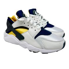 Nike Air Huarache Michigan Dd1068-107 White /Varsity Maize/Blue Retro Sizes 8-11 University Of Michigan And The Air Huaraches Are Better Known For Changing The Game With The Fab 5, But On This Navy + Maize Low Top Edition, The University's Colors Hit The Og Version Of The Nike Air Huarache. With White Leather Overlay, The Navy And Yellow Bootie Sock Ensures A Snug Fit. A Classic White Midsole Hits The Model That Has Been In Demand For Decades. Style Code: Dd1068-107 Color: White /Varsity Maize/B Casual Huaraches With Cushioned Footbed For Streetwear, Cushioned Lace-up Huaraches For Streetwear, Lace-up Huaraches With Cushioned Footbed For Streetwear, White Lace-up Huaraches For Streetwear, Nike Low-top Huaraches For Streetwear, Urban White Custom Sneakers With Vibram Sole, White Urban Custom Sneakers With Vibram Sole, Nike Sporty Huaraches For Streetwear, Nike Casual Huaraches For Streetwear