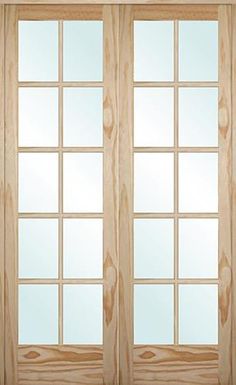 a pair of wooden doors with glass on the front and side panels in light wood