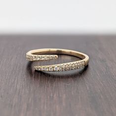 A stackable wrapped open band in 14k solid gold that can sit with your ring perfectly, or be worn on its own! Designer Silver Jewellery, 14k Gold Wedding Band, Jewelry Showcases, Gold Wedding Band, Earring Findings, Pendant Bracelet, Gold Wedding, Estate Jewelry, Diamond Wedding