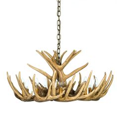 a chandelier with antlers hanging from it