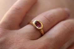 Pink Tourmaline set in gold-plated sterling silver ring. The ring in the photo is size FR 52, but it can be made to order as well, don't hesitate to write me for any custom order. here is an online ring size converter http://www.ringsizes.co/ If you don't know your ring size, check this method: https://www.instagram.com/p/CTmHVMkATEg/ here is an online ring size converter http://www.ringsizes.co/ To see more similar rings, follow this link: https://www.etsy.com/fr/shop/AtelierTiuh?section_id=328 Ring Ideas, Plated Jewelry, Gold Plated Jewelry, Pink Tourmaline, Gold Plated Sterling Silver, Jewelry Plate, Sterling Silver Ring, Beautiful Rings, Gold Ring