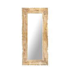 a wooden mirror sitting on top of a white wall