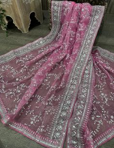 Gorgeous barely pink organza dupatta with silver embroidery and heavy sequins border. Elegant Silver Dupatta With Chikankari Embroidery, Silver Traditional Wear With Intricate Embroidery For Festivals, Semi-stitched Silver Chanderi Dupatta, Pink Dupatta With Intricate Embroidery In Traditional Drape, Pink Organza Dupatta For Eid, Pink Dupatta With Intricate Embroidery, Silver Embroidered Festival Dupatta, Silver Georgette Dupatta With Resham Embroidery, Unstitched Silver Dupatta With Zari Work