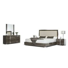 an image of a bedroom setting with bed, dresser and mirror on the sideboard