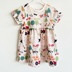 This dress will probably become your girl's favourite! The dress is made of off-white cotton jersey with farms and farm animals.  Care instructions: wash inside out on low temperature, do not tumble dry. Animals Watercolor, Watercolor Dress, Animals Care, Cotton Jersey Fabric, Dress Cotton, Toddler Dress, Skater Dress, Farm Animals, Jersey Fabric