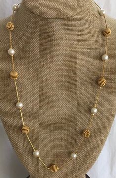 "Featuring this timeless white faux pearl and gold tone beaded chain necklace. It measures 24\" in length and is in excellent vintage condition. The necklace has a lobster claw clasp." Small Pearls Chain, Gold New Design Jewellery, Gold Pearl Long Necklace For Formal Occasions, Elegant Gold Beaded Necklaces Wire Wrapped, Elegant Gold Beaded Necklace With Wire Wrapped Detail, Elegant Gold Wire Wrapped Beaded Necklace, Gold Pearl Beaded Long Necklace, Gold Beaded Long Pearl Necklace, Gold Pearl Long Necklace