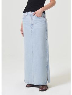 Sitting square on the hips with an elongated length, the Astrid skirt features finished slices at the outseams. 100% Regenerative Cotton Made In USA Toe Ring Sandals, Column Skirt, Long Denim Skirt, Mother Denim, Draped Fabric, Romper With Skirt, Knit Vest, Premium Denim, Dresses With Leggings