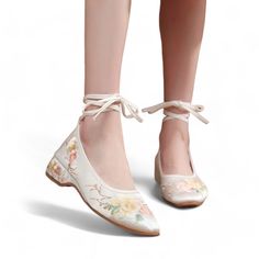 ❁Embrace Timeless Elegance and Comfort: White Lace-Up Ballet Flats with Delicate Florals Unveil a fusion of classic style and breathable comfort with our stunning white lace-up ballet flats featuring delicate floral embroidery!  These exquisite shoes are meticulously crafted to elevate your everyday look while keeping your feet cool and happy. ❁Crafted with Love and Attention to Detail: ⋆Silky Smooth Exterior Material: Luxurious fabric offers a touch of sophistication. ⋆Delicate Floral Embroider Beige Round Toe Wedding Shoes For Spring, Beige Summer Wedding Shoes With Round Toe, Formal Flat Heel Wedding Shoes For Spring, Beige Closed Toe Wedding Shoes For Spring, Summer Ceremony Heels With Round Toe, Spring Ceremony Ankle Strap Heels, Summer Wedding Heels With Floral Embroidery, Spring Wedding Shoes With Pointed Toe, Spring Wedding Shoes With Low Heel