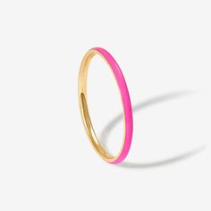 This is the confident pop of neon you didn't know you needed. Minimal by design, Oburu lights up your hands and your jewelry box. Slim, intense and vibrant enamel unexpectedly plays well with others. Created for you in solid 14 karat gold, you'll want to wear this ring always and never take it off, even when in the shower or at the gym. Pink Enamel Stackable Jewelry, Pink Enamel Stackable Ring As Gift, Pink Stackable Enamel Ring As A Gift, Trendy Enamel Ring For Everyday, Trendy Pink Enamel Jewelry, Trendy Everyday Pink Rings, Trendy Pink Enamel Ring As Gift, Trendy Pink Enamel Ring For Gift, Bold Pink Jewelry For Gifts