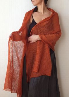 This knitted lightweight shawl is a perfect accessory for special occasions and everyday wearing. It is very comfortable to wear. So soft and pleasant to the touch.  There are many wearing options. Cover up your shoulders, wear it as a scarf around your neck, or wrap it around your head. Style it with a light dress or a warm jacket and coat.  The scarf can be worn both in summer and in the cooler seasons. It is knitted of 100% linen yarn. Linen is natural, non-allergenic, non-static, gives UV pr Silk Shawl Terracotta, Dress Shawl Cover Up Brown, Mantel Cover Scarf, Elegant Shawl Wraps For Layering, Elegant Shawl Wrap For Layering, Shawl For Layering, Elegant Wrap Shawl For Layering, One Size Shawl Wrap For Spring, One Size Spring Shawl Wrap