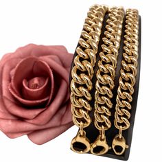 "𝓦𝓮𝓵𝓬𝓸𝓶𝓮 𝓽𝓸 𝓛𝓲𝓸𝓷𝓱𝓮𝓪𝓻𝓽 𝓳𝓮𝔀𝓮𝓵𝓻𝔂 𝓢𝓱𝓸𝓹 ♥ Gorgeous high quality Miami Cuban Bracelets crafted in high quality 14 K Italian Yellow Gold. Please note these bracelets are handmade and cut to any length you want us to make. Listing is set for 6\", 7\" and 8\" in length. If the length you want is not listed as an option for us to make please send us a message and we will send you a link for it. Please allow 1-4 weeks for delivery Style 1: 7.5 mm Width Style 2: 9.0 mm Width Sty Luxury Cuban Link Bracelet With Chunky Chain, Luxury Bracelets With Chunky Cuban Link Chain, Luxury Metal Bracelet With Chunky Chain, Luxury Link Bracelet With Chunky Chain, Luxury Chunky Chain Bracelet, Luxury Bangle Bracelets With Chain Detail, Luxury Gold Chain Link Bracelets, Luxury Gold Bracelet With Chunky Chain, Luxury Link Bracelets With Lobster Clasp