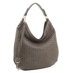 Say hello to Nora, your new favorite hobo bag! Crafted with a stylish woven design, this hobo is sure to make a statement. And with room for all your essentials, you can make sure you're ready for anything life throws at you! Size: 15.5"L x 1"W x 12"H, 10"drop strap * Optional adjustable shoulder strap * Faux-leather material * Gold-tone hardware * Exterior - 1 rear zip pocket * Zipper closure Intrecciato Weave Hobo Shoulder Bag For On-the-go, Woven Leather Hobo Tote Bag For On-the-go, Modern Woven Hobo Shoulder Bag, Modern Woven Leather Hobo Bag For Travel, Modern Hobo Bag With Braided Handles For Everyday, Modern Travel Hobo Bag In Woven Leather, Modern Travel Hobo Bag With Woven Leather, Hobo Bag With Braided Double Handles For Errands, Modern Woven Hobo Bag With Double Handle