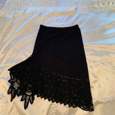 Beautiful, High-Quality Black Nylon Tube Skirt With Lace Lined Hem. Size Xs. Bcbg. Never Worn! This Black Skirt Is A Unique, Rich-Looking Item Perfect For Vacation Or Dressy Events. Pair With A Simple White Blouse And Let The Lace Stand Out! Black Mini Skirt With Asymmetrical Hem For Summer, Black Asymmetrical Mini Skirt For Summer, Chic Black Skirt With Handkerchief Hem, Chic Black Handkerchief Hem Skirt, Black Party Skirt With Handkerchief Hem, Black Handkerchief Hem Skirt For Party, Black Handkerchief Hem Party Skirt, Black Fitted Mini Skirt With Asymmetrical Hem, Fitted Black Mini Skirt With Asymmetrical Hem